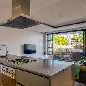 Kitchen to Living; APARTMENT ON C - Sea Point
