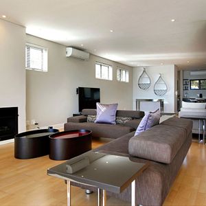 Living & TV area; MEDBURN PENTHOUSE - Camps Bay