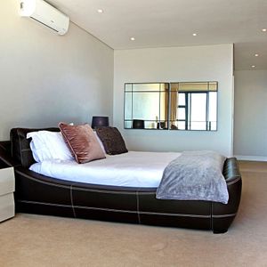 Master bedroom; MEDBURN PENTHOUSE - Camps Bay