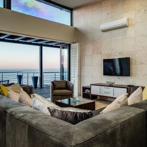 Upstairs TV lounge; SEA AND ROCK VILLA - Camps Bay