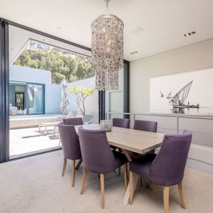 Open plan dining; LOADER VILLA - De Waterkant