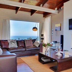 Living area & fire place; OUDERKRAAL PLACE - Camps Bay