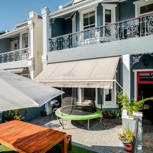 Balcony and front entrance; RED HOUSE - Sea Point