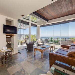 Lounge with views; OCEAN VIEW TREASURE -Sea Point