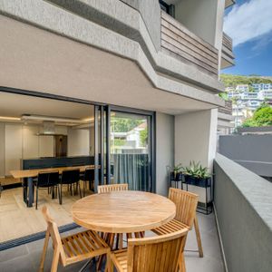 Balcony and partial mountain view; APARTMENT ON G - Sea Point