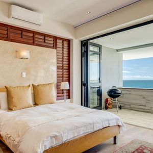 Master bedroom with views; BALI SUITE - Camps Bay