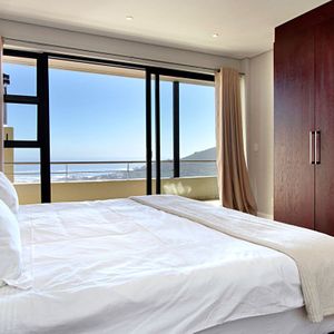 Second bedroom & Views; MEDBURN PENTHOUSE - Camps Bay