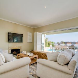 Lounge with TV; PRIDE VILLA - Camps Bay