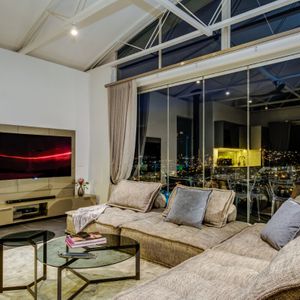 Living room with TV; MITHRAS HOUSE - Tamboerskloof