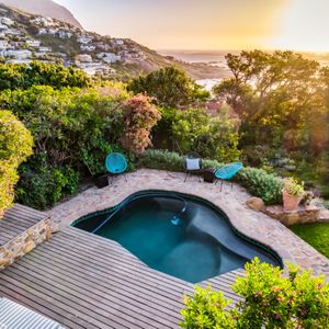 Swimming pool and sunset views; LIERMANS VILLAs - Llandudno