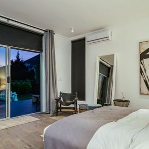 Bedroom with courtyard access; MITHRAS HOUSE - Tamboerskloof