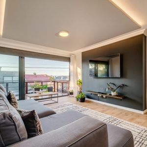 TV Lounge & Balcony; IVORY MANOR - Green Point