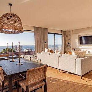 Open plan living room with views; SUNSHINE POINT - Sea Point