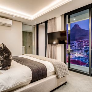 Master bedroom; ATTIQUE VIEW PENTHOUSE - Sea Point